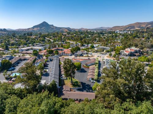 an aerial view of a town with mountains in the background at Peach Tree Inn in San Luis Obispo