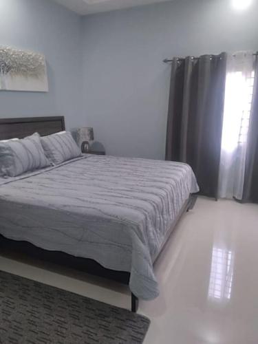 Ένα ή περισσότερα κρεβάτια σε δωμάτιο στο Montana Villa