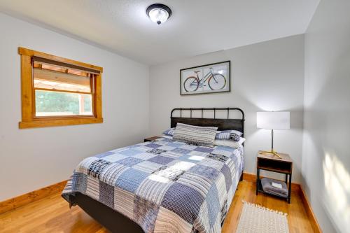 a bedroom with a bed and a window at Red River Gorge Cabin Hike and Relax! in Rogers