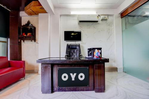 Телевизор и/или развлекательный центр в Super Hotel O The Maruti hotel