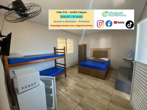 a room with two bunk beds and a sign that reads club fire ninja citizen at Cabo Frio - Jardim Caiçara - Aluguel Econômico in Cabo Frio