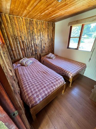 Postel nebo postele na pokoji v ubytování Cabaña Vistas de Quintay
