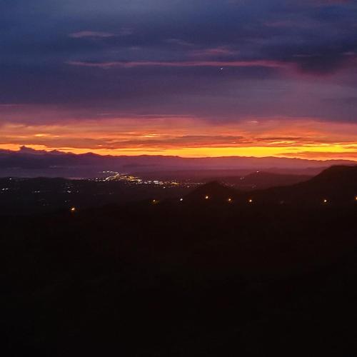 a view of a sunset from the top of a mountain at Tierra Vital Atenas Villa 2 in Atenas