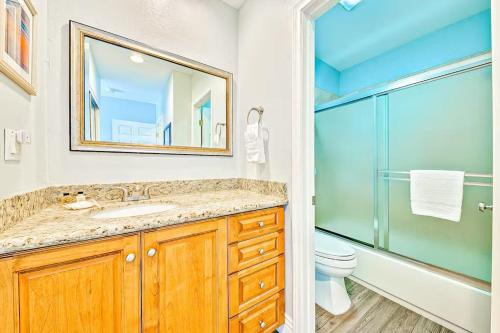 a bathroom with a sink and a shower and a toilet at Condo in Newport Beach with Private Balcony and Ideal Location by the Pier in Newport Beach