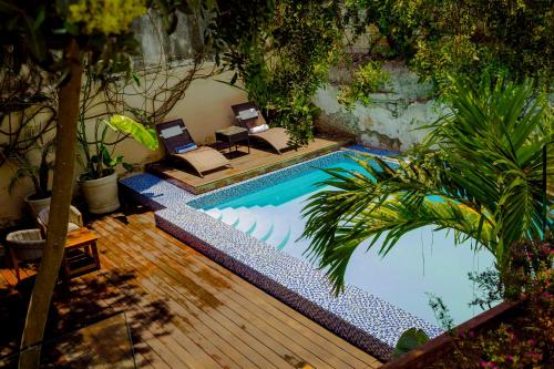 Bazén v ubytování Hotel Boutique Hacienda Guadalupe nebo v jeho okolí