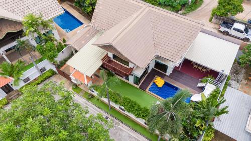 an overhead view of a house with a pool at Amazing Natcha villa in Pattaya