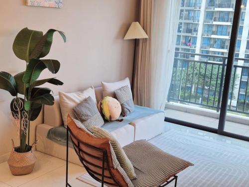 Χώρος καθιστικού στο Serene and peaceful 2 Bedrooms 3 Pax - 10 Min to CIQ