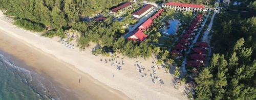 a group of people on a beach near the water at Sea Sun Beach Resort Koh Kho Khao in Ban Thung Tuk