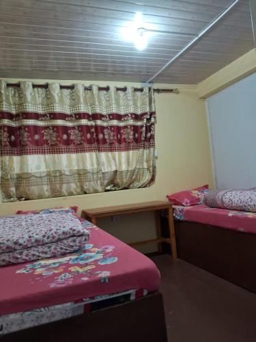Postel nebo postele na pokoji v ubytování Mountain View Lodge