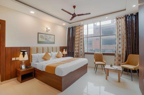 Postel nebo postele na pokoji v ubytování Hotel Devine Zirakpur Chandigarh