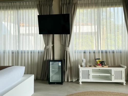 Art of Nature Hotel - Sea View - Adults Onlyにあるテレビまたはエンターテインメントセンター