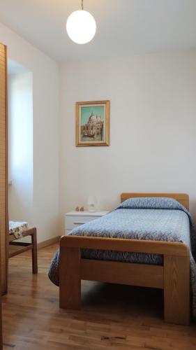 Postel nebo postele na pokoji v ubytování Al Piccolo Borgo Antico