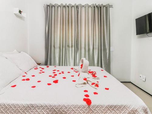 Ένα ή περισσότερα κρεβάτια σε δωμάτιο στο Hotel Dunas Vila Cumbuco