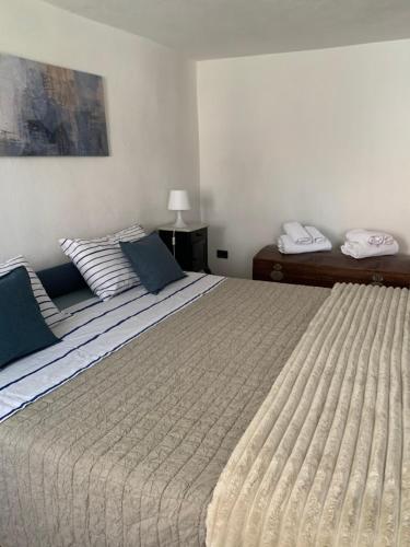 a bedroom with a large bed in a room at Ca d’Censo in Marsaglia
