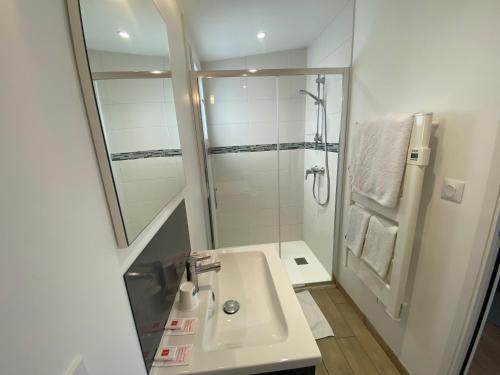 Koupelna v ubytování B&B de Saint Come de Fresné