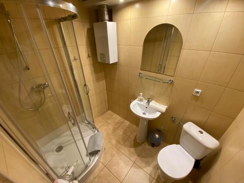 Ένα μπάνιο στο Apartments Legendary Kraków