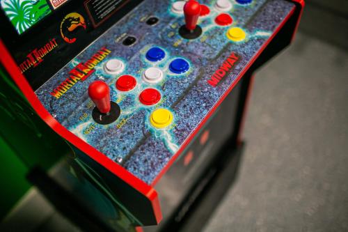 a close up of a video game remote control at Thematic House with Private PoolSpaGame Room in Loughman
