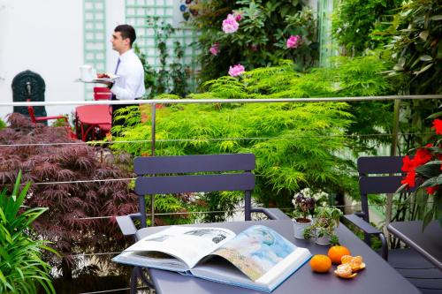 Jardín al aire libre en Hôtel Mistral