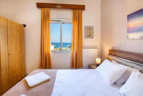 Ένα ή περισσότερα κρεβάτια σε δωμάτιο στο "Thea" Apartment 1
