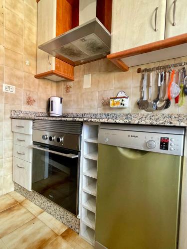 Η κουζίνα ή μικρή κουζίνα στο Amplitud y comodidad en Marín Centro