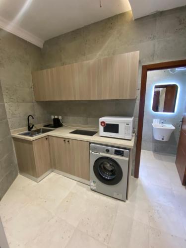 Η κουζίνα ή μικρή κουζίνα στο WATEEL apartment