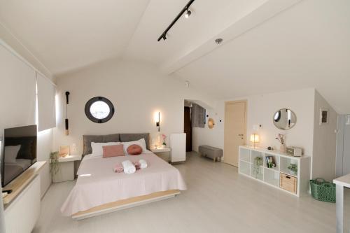 Ένα ή περισσότερα κρεβάτια σε δωμάτιο στο Ονείρου δώμα