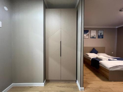 Postel nebo postele na pokoji v ubytování Aish hotel