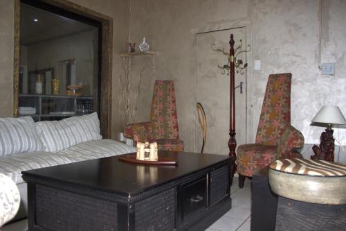 Χώρος καθιστικού στο Petra Lodge