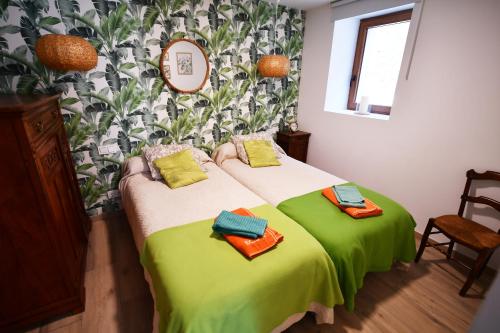 Postel nebo postele na pokoji v ubytování Casa karrikaburu