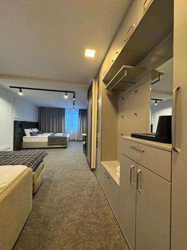 Ein Bett oder Betten in einem Zimmer der Unterkunft Main Spessart Terrasse Hotel