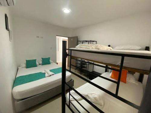 Postel nebo postele na pokoji v ubytování Shekinah House