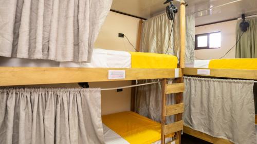 Cama o camas de una habitación en Argdivan Hostel