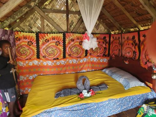 Katil atau katil-katil dalam bilik di island paradis bungalowd