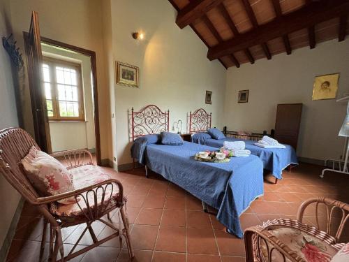 Ένα ή περισσότερα κρεβάτια σε δωμάτιο στο Longoio Garden Cottage Charm