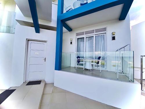 a view of the balcony of a house with a door at Recidencia Del Hamor Beach Front in Santa Magdalena