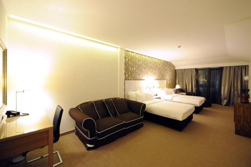 Hotel 1000 Ruzaにあるベッド