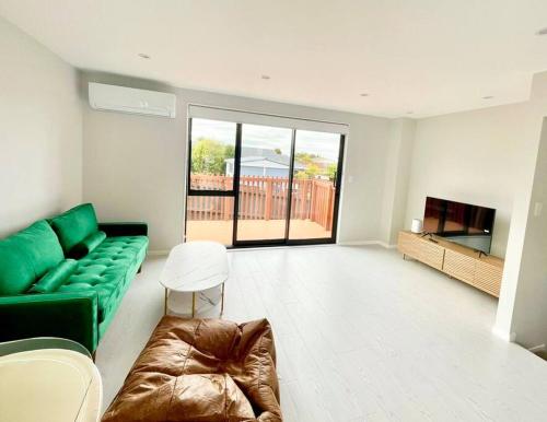 Posezení v ubytování Townhouse in New Lynn