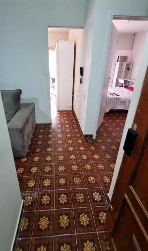 a room with a hallway with a room with a floor at Apart Hotel Copacabana in Rio de Janeiro
