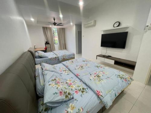 Postel nebo postele na pokoji v ubytování Nyaman Sweet Home