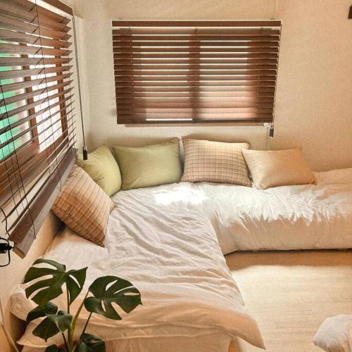 Katil atau katil-katil dalam bilik di Anri forest Stay #5people#rooftop#laundry