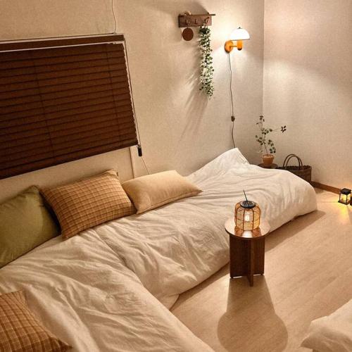 Katil atau katil-katil dalam bilik di Anri forest Stay #5people#rooftop#laundry