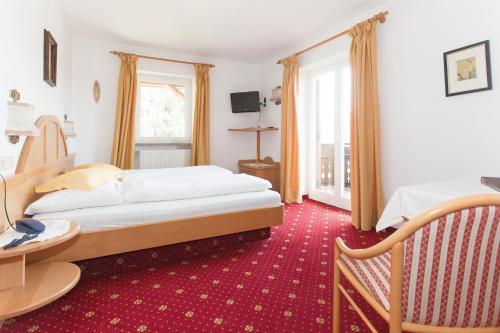 Postel nebo postele na pokoji v ubytování Hotel Lichtenstern
