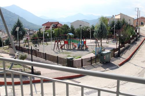 a park with a playground with at Vagelis 2 Nemea apartments in Neméa