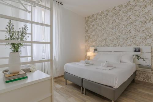 En eller flere senge i et værelse på Family 3