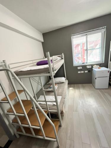 Katil atau katil-katil dalam bilik di PayaThai B&B