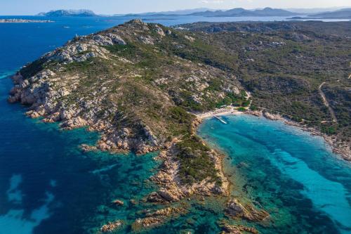 an aerial view of a small island in the ocean at Cervo Hotel,Costa Smeralda Resort in Porto Cervo