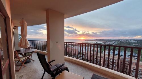 a balcony with a view of the ocean at O WOW View Portimao, ALvor, ALGARVE in Portimão