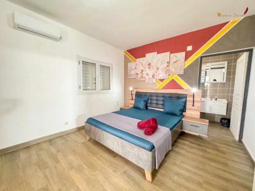 Postel nebo postele na pokoji v ubytování Villa Esthera Appartement Etage