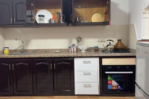 Kuchyň nebo kuchyňský kout v ubytování Cosy Appartement in Tiznit