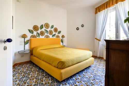 Ένα ή περισσότερα κρεβάτια σε δωμάτιο στο Villa Felicita